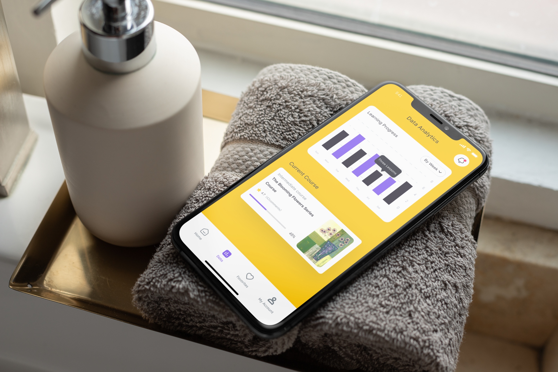 iphone-xs-max-mockup-resting-over-a-towel-in-a-bathroom-25895.jpg